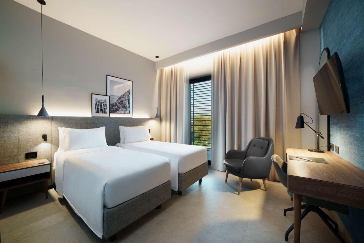 Radisson Hotel Nola Naples エクステリア 写真